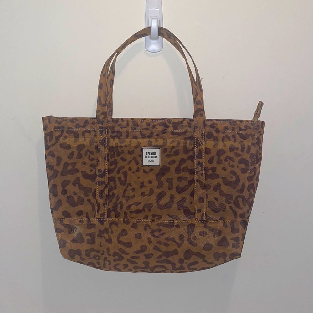 Opening Ceremony “Chinatown” small mesh tote in brown leopard print